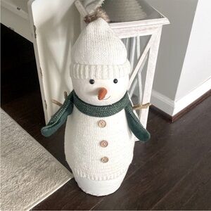 Adorable large snowman figure.